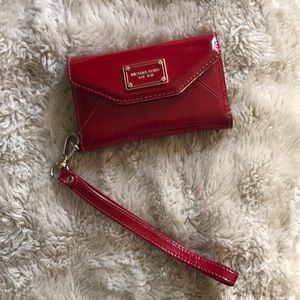 Micheal Kors red wristlet